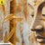 Leinwandbild Buddha Statue Im Goldenen Bambus Hochformat Zoom